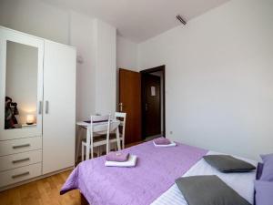 Postel nebo postele na pokoji v ubytování Apartments & Rooms Rendulić