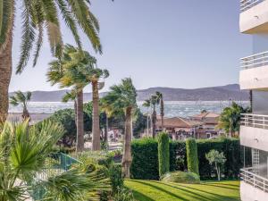 a view of the ocean from the balcony of a building at Studio Le Mexico-8 by Interhome in Saint-Raphaël