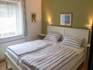 Posteľ alebo postele v izbe v ubytovaní Holiday Home Ferienpark Himmelberg-5 by Interhome
