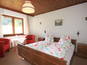 A bed or beds in a room at Holiday Home Martina by Interhome
