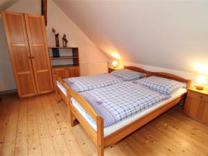 En eller flere senge i et værelse på Holiday Home Polžov by Interhome