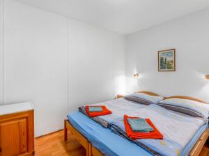 Postel nebo postele na pokoji v ubytování Holiday Home Měřín by Interhome