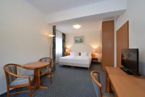 Danubius Hotel Raba客房内的一张或多张床位