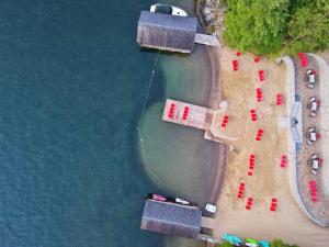an aerial view of a parking lot next to the water at The Stone Gate Resort in Lake George