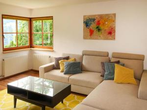 a living room with two couches and a coffee table at Apartment Appart Vroni by Interhome in Fliess