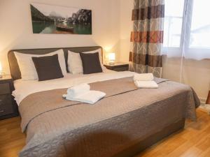 A bed or beds in a room at Apartment Sigel by Interhome