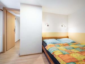 Postel nebo postele na pokoji v ubytování Holiday Home Dolníky u Trutnova by Interhome