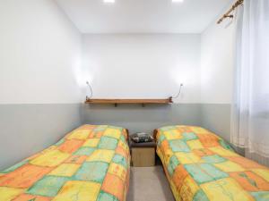 Postel nebo postele na pokoji v ubytování Holiday Home Dolníky u Trutnova by Interhome