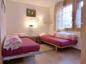 Postel nebo postele na pokoji v ubytování Apartment Laerchehus West by Interhome