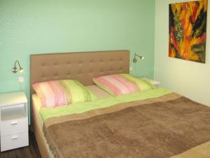 Postel nebo postele na pokoji v ubytování Apartment Tulpe by Interhome