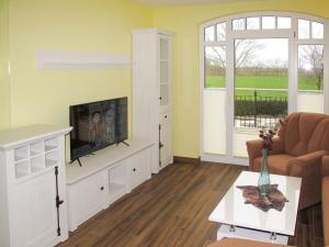 TV a/nebo společenská místnost v ubytování Apartment Tulpe by Interhome + 31 fotografií
