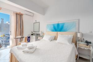 Postel nebo postele na pokoji v ubytování Hotel Lido Thassos