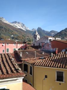 a view of the roofs of a city at Carrara Bella in Carrara