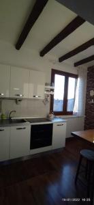 Kuchyňa alebo kuchynka v ubytovaní Casa di Nonno