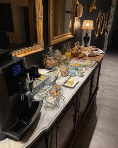 a table filled with food on top at Domaine de la Jarrige in Saint-Vaury