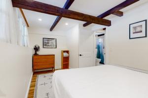 A bed or beds in a room at 7 Merrimeeting Chalet