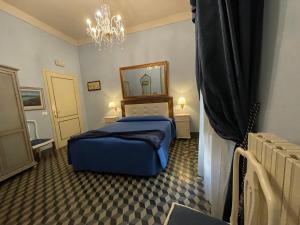 Postel nebo postele na pokoji v ubytování La Bohème