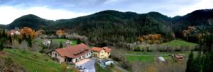an aerial view of a house in the middle of a mountain at Casa Rural Andikoetxe Landetxea in Aulestia