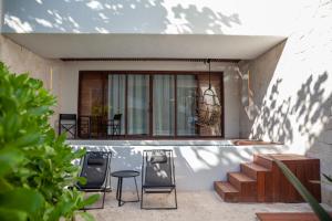 Posezení v ubytování Tago Tulum by G Hotels