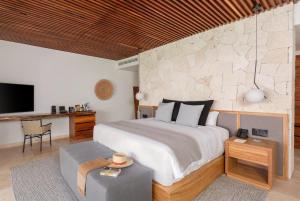 TV a/nebo společenská místnost v ubytování Tago Tulum by G Hotels