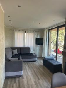 Khu vực ghế ngồi tại Apartman Una