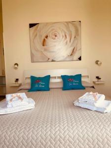 Een bed of bedden in een kamer bij Casa la Roccia