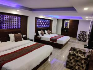 Кровать или кровати в номере Hotel Hamers International