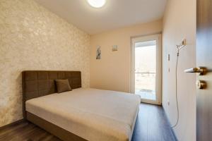 Voodi või voodid majutusasutuse Forest Földvár Apartmanok By BLTN toas