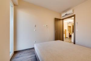 Voodi või voodid majutusasutuse Forest Földvár Apartmanok By BLTN toas