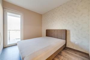 Voodi või voodid majutusasutuse Forest Földvár Apartmanok By BLTN toas