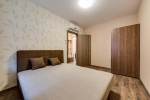 Voodi või voodid majutusasutuse Forest Földvár Apartmanok By BLTN toas
