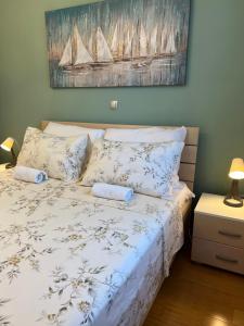 Posteľ alebo postele v izbe v ubytovaní Apartment Garden