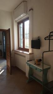 TV a/nebo společenská místnost v ubytování Agriturismo Podere I' Caldino