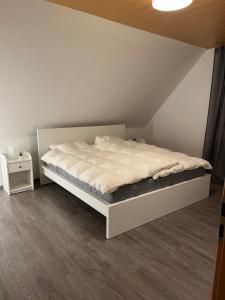 Postel nebo postele na pokoji v ubytování Ferienhaus Meinke