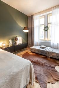 Posteľ alebo postele v izbe v ubytovaní TurnKey I Main Bus Station Apartments