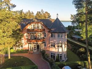 an aerial view of a large house at Seepark Heidenholz, Plau am See in Plau am See