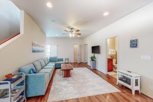 a living room with a couch and a table at Pikes Peak West in Flagstaff