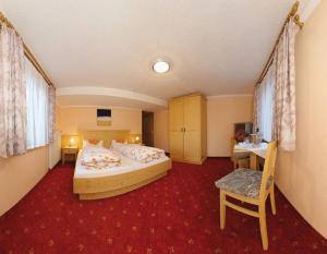 Postelja oz. postelje v sobi nastanitve Hotel Gasthof Walcher