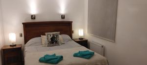 Rúm í herbergi á Casa del Kayak +7 myndir