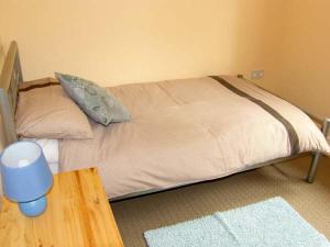 Postel nebo postele na pokoji v ubytování Ffynnon Dewi