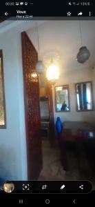 a blurry picture of a living room with a door at marrakech palmeraie village Etablissement jasmin in Marrakech