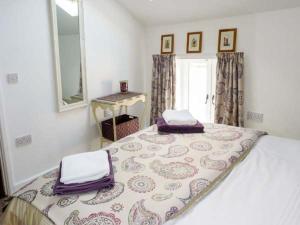Katil atau katil-katil dalam bilik di Woodstone Barn