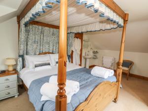 Postel nebo postele na pokoji v ubytování Tangaer Cottage