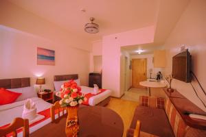 Sjónvarps- og/eða afþreyingartæki á Cedar Peak Condominium by Tripsters Hub
