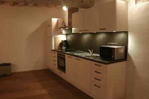 Kuchyň nebo kuchyňský kout v ubytování Stilvolle Wohnung auf 50 m² mit Parkplatz und WiFi