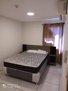 En eller flere senge i et værelse på Apart 2 habitaciones vista a Itaipú - 32