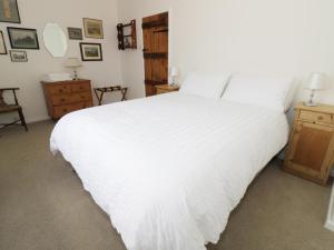 Posteľ alebo postele v izbe v ubytovaní Glencoe Cottage