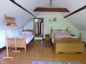 Postel nebo postele na pokoji v ubytování Ash Farm Cottage
