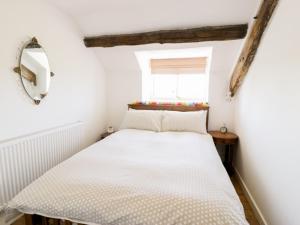 เตียงในห้องที่ 2 Borthwen Cottages