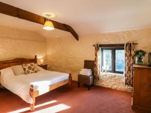 Postel nebo postele na pokoji v ubytování Carthorse Cottage + 21 fotografií